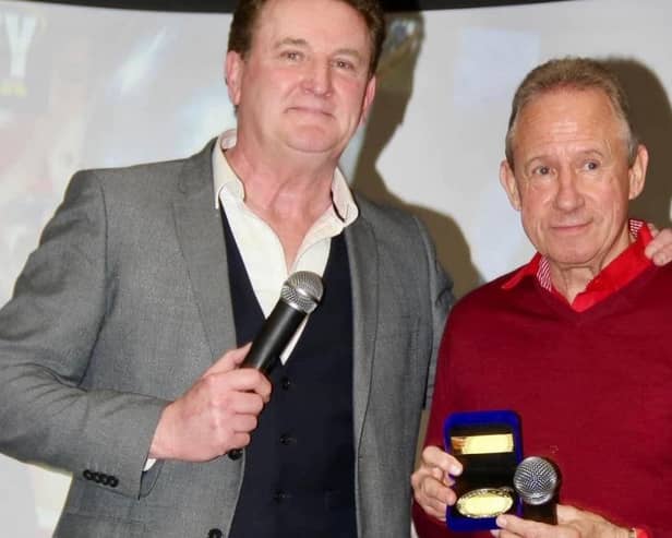 Former Hartlepools United and Nottingham Forest European Cup winner John McGovern with his medal arranged by Paul 'Goffy' Gough (left).