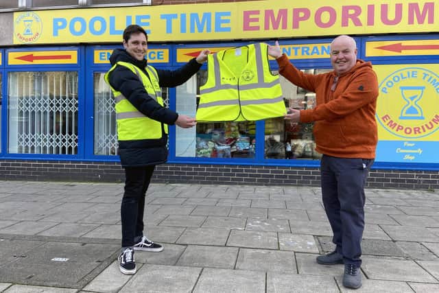 Dave Hunter (right) from Poolie Time Exchange presents a Hi-Viz vest to Jason Bland from Hartlepool Big Tidy Up Group. Picture by FRANK REID