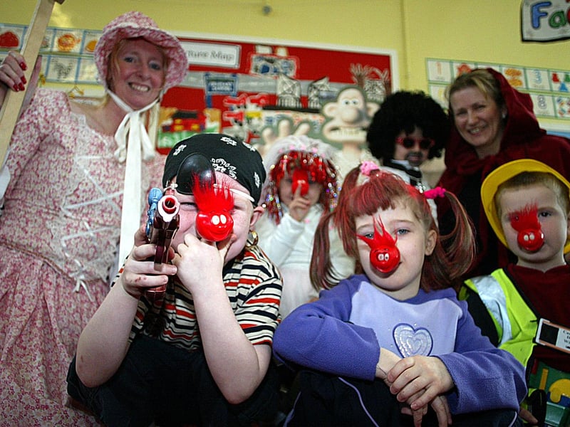 The reception class at Lord Blyton Primary School was having a great time on dress-up day for Comic Relief in 2003.
