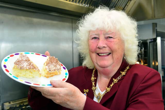 Councillor Mary Fleet with one of the cakes she help make at Rift House Primary School in 2014.