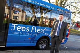 Tees Valley Mayor Ben Houchen and one of the Tees Flex buses.