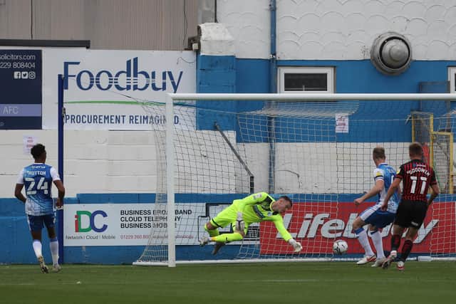 Barrow's Paul Farman is beaten by Tyler Burey's shot to level the score at 1-1   during the Sky Bet League 2 match between Barrow and Hartlepool United at Holker Street, Barrow-in-Furness on Saturday 14th August 2021. (Credit: Mark Fletcher | MI News)