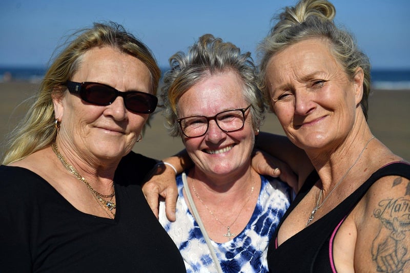 Left to right, Jacqueline Lewis, Deborah Oliver and Allison Lewis enjoying the sun at Seaton Carew. Picture by FRANK REID