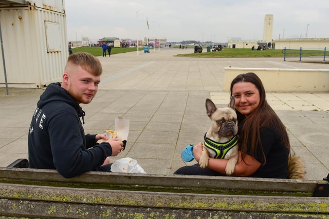 Rhys Hope and Isha Wood with their dog Fendi tuck in at Seaton Carew.