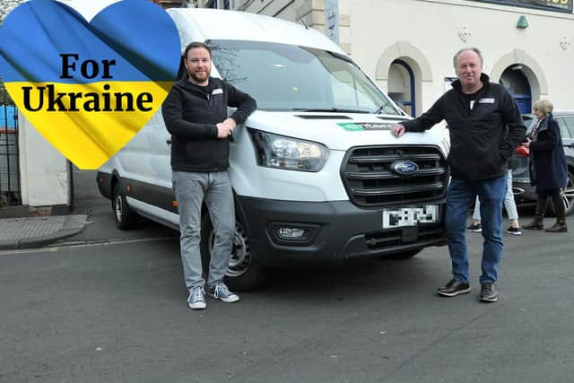 Kevin, left, and Graham Hogg with a van packed with aid destined for Ukraine.
