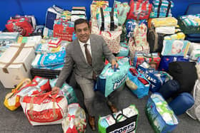 Hartlepool United Chairman Raj Singh with a small selection of items donated so far towards the club's new Ukraine appeal. Picture by FRANK REID.