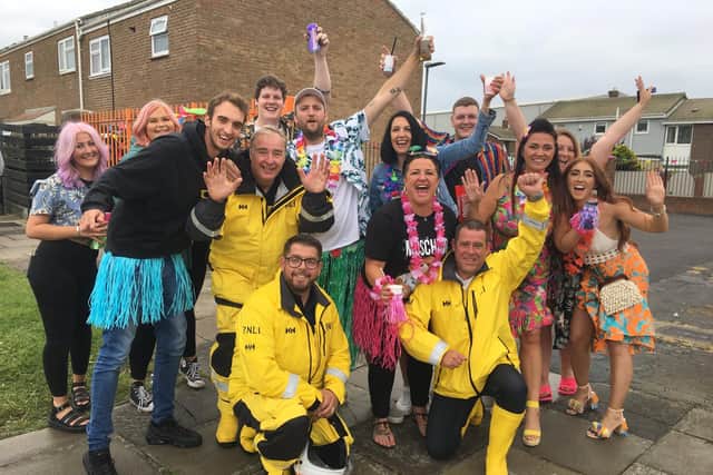 Hartlepool RNLI volunteers with spectators and participants during the carnival parade on Saturday./Photo: Hartlepool RNLI