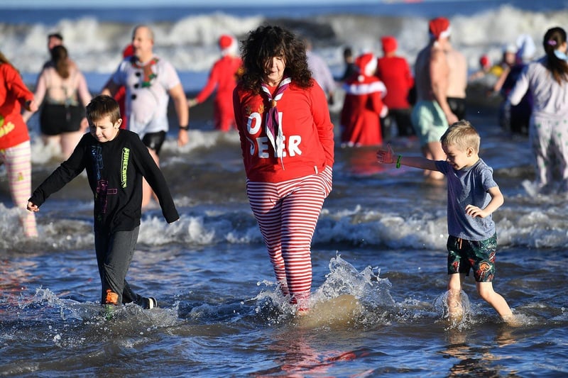 Having a paddle at the Boxing Day Dip at Seaton Carew. Picture by FRANK REID