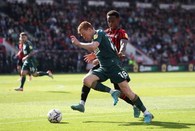 Middlesbrough's Duncan Watmore (left) and Bournemouth's Ethan Laird battle for the ball during the Sky Bet Championship match at the Vitality Stadium, Bournemouth. PA.