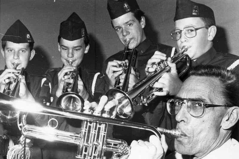 Councillor John Turner gets a fanfare from trumpeters of the 10th South Shields Boys Brigade, left to right:  Wayne Hobbs, Neil Hoggeth, Garry Dinning, Phillip Williams, when he officially handed over the trumpets on behalf of South Tyneside Council. Remember this?