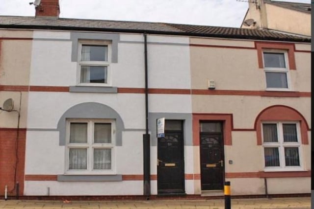 The two-bedroomed home in Derwent Street (pictured, door on the left) is to be sold by auction later this month.