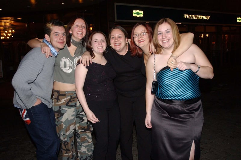 A group of friends enjoying a night out in Hartlepool in December 2003.