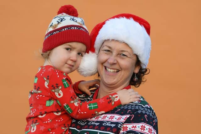 Harper with her mum Liz Metcalf before they take part in the Boxing Day Dip at Seaton Carew Picture by FRANK REID