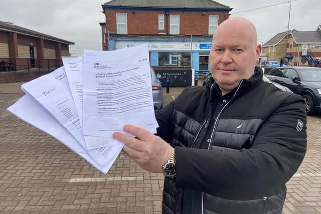 Lee Pennick with a selection of his correspondence relating to his parking fight at Hartlepool marina. Picture by FRANK REID
