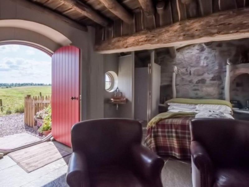 The quirky and colourful round doors lead to a comfortable and cozy haven.