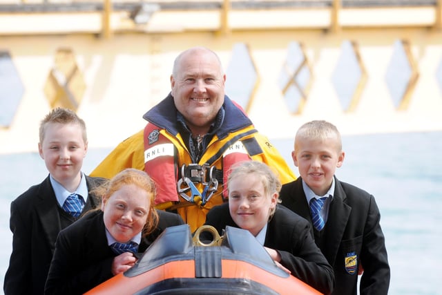 Hartlepool RNLI mechanic Garry Waugh is pictured with Dene Community School of Technology pupils Bradley Williams, Courtney Maddison, Emmie Martin and Jordan Penman in 2011.