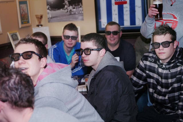 Football fans watching a match in 3D at the Mill House Pub in April 2010.