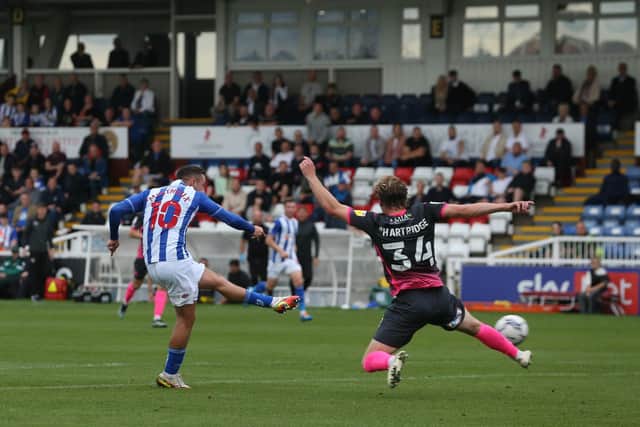 Hartlepool United's Luke Molyneux shoots and scores their first goal during the Sky Bet League 2 match between Hartlepool United and Exeter City at Victoria Park, Hartlepool on Saturday 25th September 2021. (Credit: Mark Fletcher | MI News)