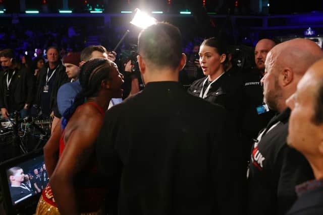 Claressa Shields argues with  Savannah Marshall ringside after the WBA, IBO AND WBF Women's Middleweight Title fight between Claressa Shields and Erna Kozin at Motorpoint Arena Cardiff on February 05, 2022 in Cardiff, Wales. (Photo by Huw Fairclough/Getty Images)