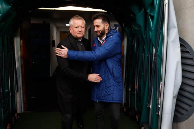 Carlos Corberán head coach of Huddersfield Town greets Chris Wilder the manager of Middlesbrough. (Photo by John Early/Getty Images)
