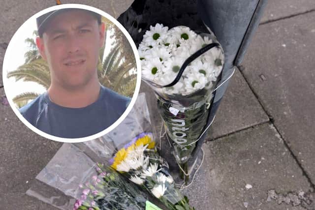 Floral tributes have been left in Sydenham Road for Adam Thomson (inset).