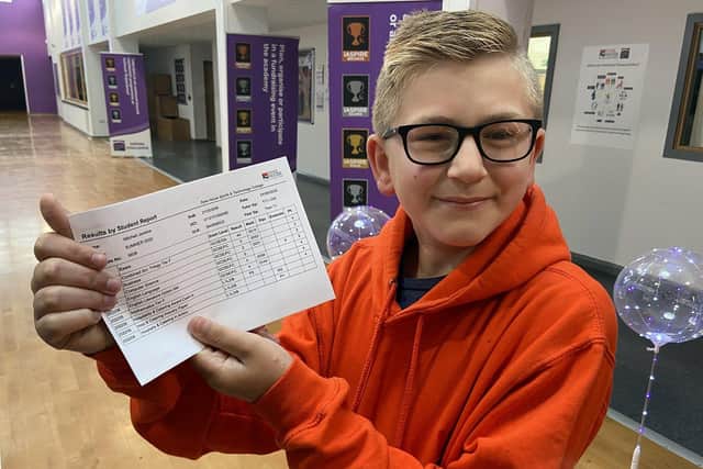 Mitchell Jenkins with his GCSE results at Dyke House School.