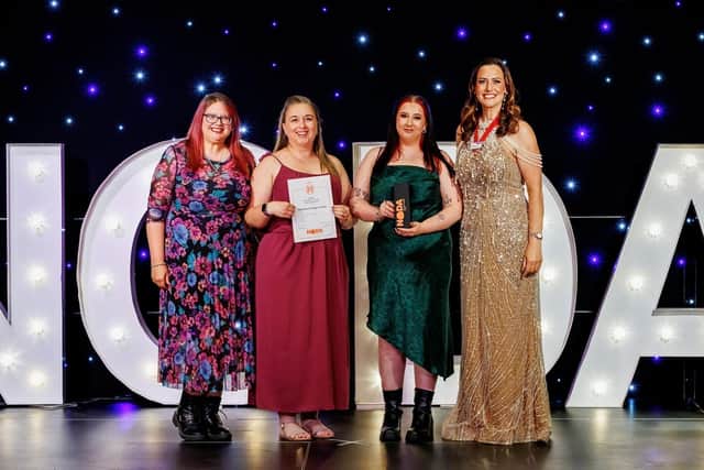Hartlepool Junior Stage Society winning the Best Junior Concert Award. Pictured: Katy Scanlon, Sarah Charlton, and Liv Kidson with NODA North District 4 representative Helen Abraham. Photo: One Imagery