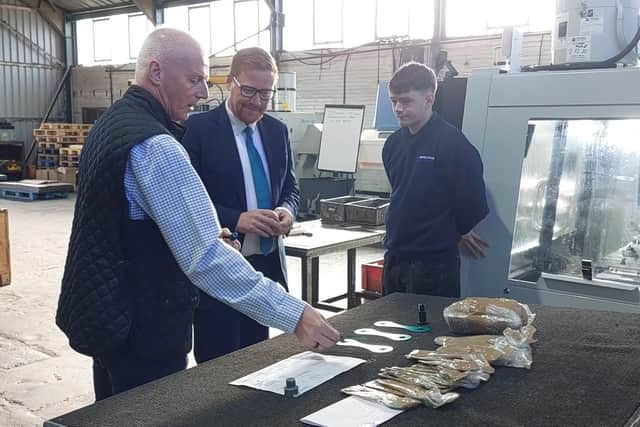 Jonathan Brash MP during a tour of the factory by MD Andy Pailor (left) with his son Thomas.