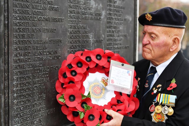 Veteran John Howard with a wreath in memory of his brother before the Remembrance Day parade Victory Square, Hartlepool. Picture by FRANK REID