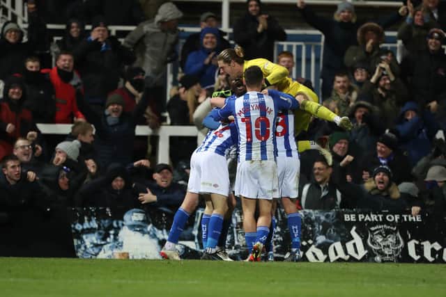 Hartlepool United's Mark Shelton celebrates with his team mates after scoring  during the Sky Bet League 2 match between Hartlepool United and Rochdale at Victoria Park, Hartlepool on Wednesday 8th December 2021. (Credit: Mark Fletcher | MI News)