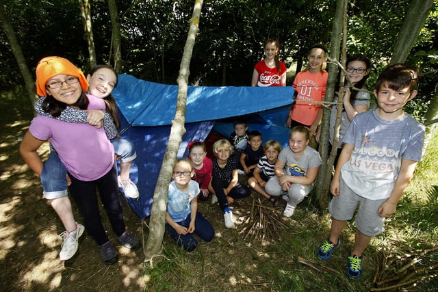 Children take part in a den building session at Summerhill Country Park in 2015.