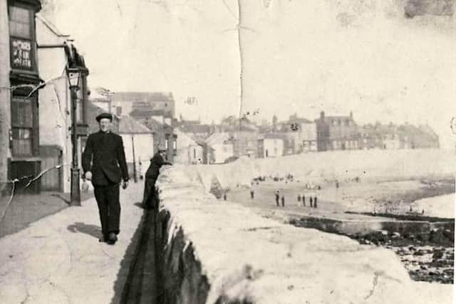 David Bunton near the Town Wall as he walked to work for his job as a ferryman.