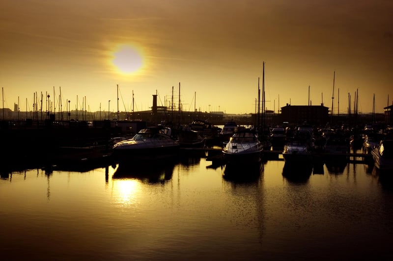 A 2013 photo by Tom Yeoman of the sun shining over the Marina on a winter's day.