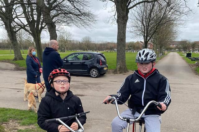 Well done boys! James and Harry pictured at the end of their final ride.