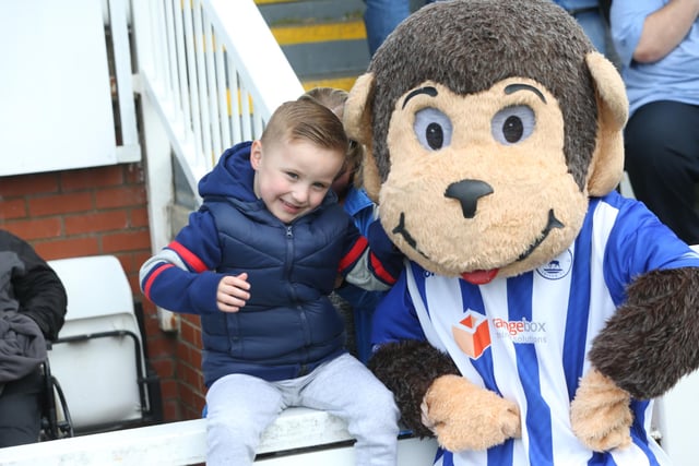 H'Angus the Monkey poses with Hartlepool United supporters ahead of the League Two clash with Port Vale. (Credit: Mark Fletcher | MI News)