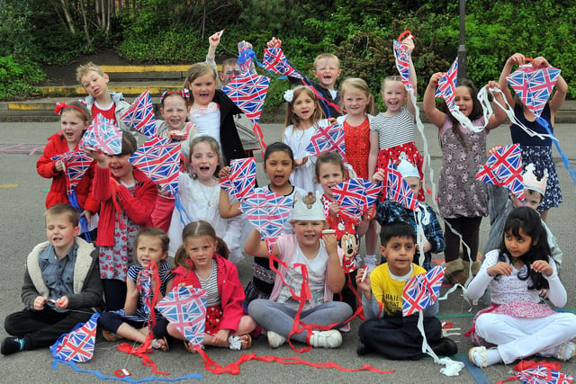 Key stage one children celebrate the Queen's Jubilee in 2012.