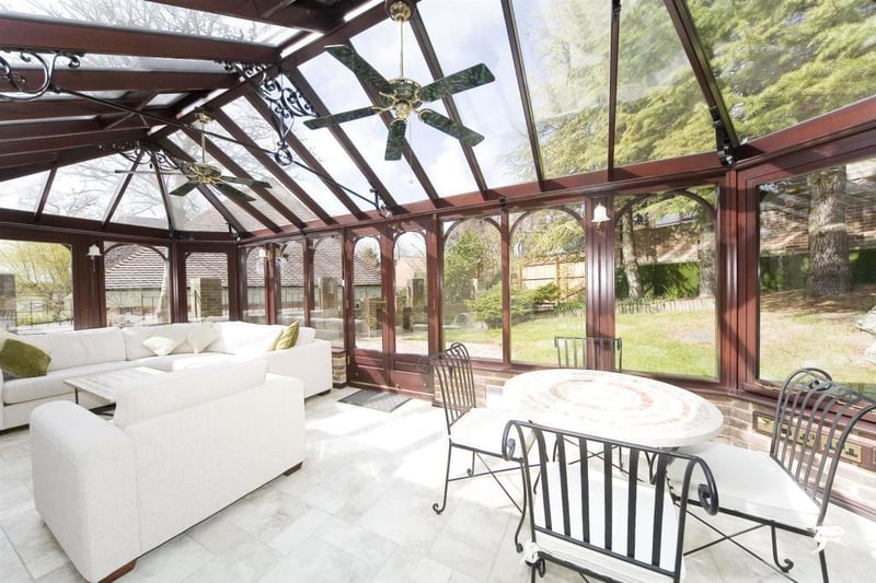 The conservatory is one of the highlights of the home.