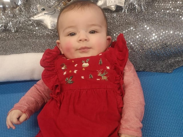 Layla, age 5 months, ready to celebrate Christmas.