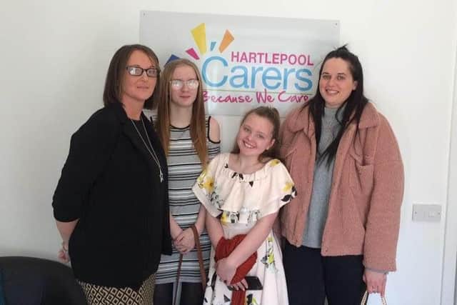 Chief Executive Officer of Hartlepool Carers Christine Fewster with support worker Roxanne Boagey and young carers Jersey McCabe and Catlin Surtees.