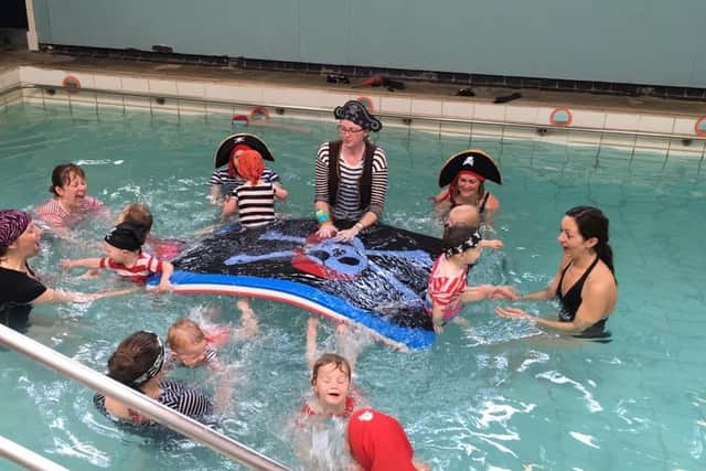 Youngsters and their parents enjoying a Water Babies session at High Tunstall swimming pool.