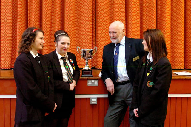 Manor College of Technology, as it was then known, raised the most money for the Royal British Legion Poppy Appeal out of all participating schools. Pictured with Rotary Club President, Ted Jackson, are (from left) pupils Natalie Henderson, Lauren Jiggins and Hannah Bew.
