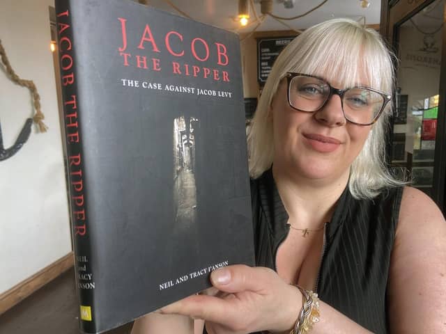Author Tracy I'Anson with her book Jacob The Ripper which she wrote with her dad Neil I'Anson. Picture by FRANK REID