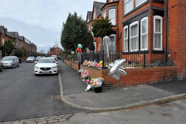 Flowers at the scene in Hamilton Avenue, Chapeltown, Leeds, where Peter Wass was killed.  Picture Steve Riding