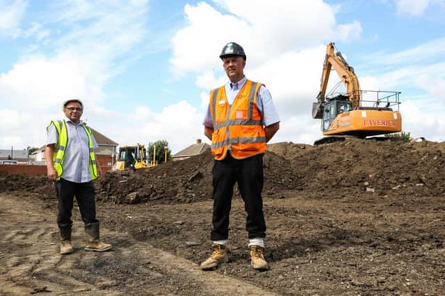 Neil Hurst, clerk of works from Thirteen and Simon Roberts of ENGIE on the site of the Newholm Court modular homes development. Picture: Chris Booth
