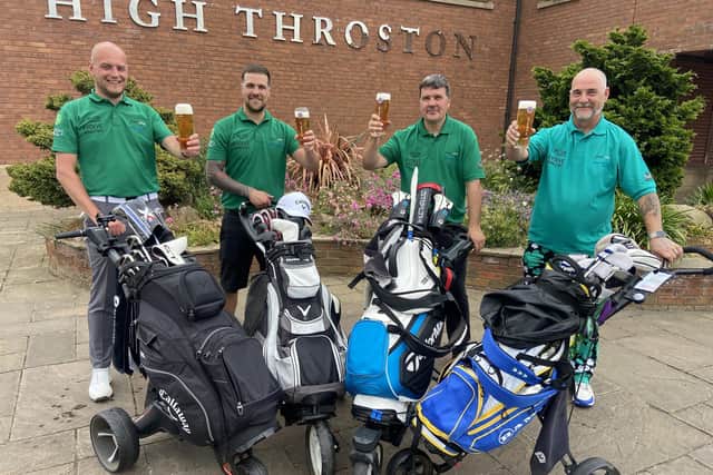 Ian Bolton (right) with fellow golfers (left to right) Michael Lamb, Liam Bolton and Mally Bolton as they celebrate the end of Macmillan's Longest Day Golf Challenge. Picture by FRANk REID