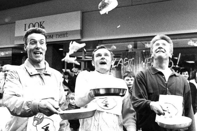 Frank Blair, Ron Williams and Graham Atkinson form part of the winning pancake tossing team in 1990.