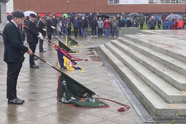 Standards are lowered, Remembrance Day parade at the War memorial, Victoria Road. Picture by FRANK REID