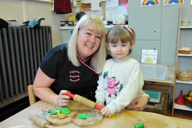 Piglets Playgroup Nursery owner Samantha Thompson with Laurie. Samantha said staff were "ecstatic" following the nursery's good Ofsted judgement.

Picture by FRANK REID