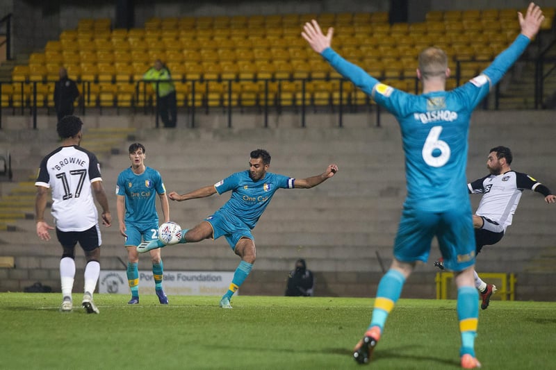 Benning slices an effort high and wide of the Port Vale goal in the Leasing.com Trophy clash at Vale Park.