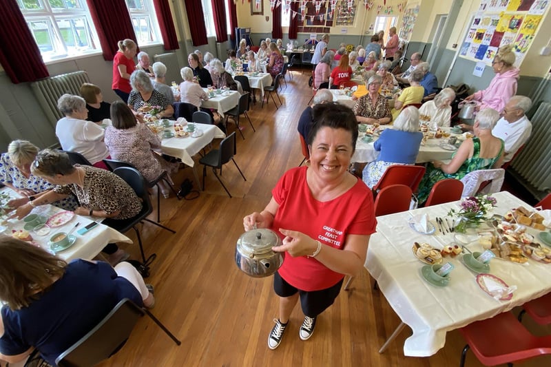 Emma Armstrong gets ready to re-fill the cups at Greatham Feast's pensioners afternoon tea.